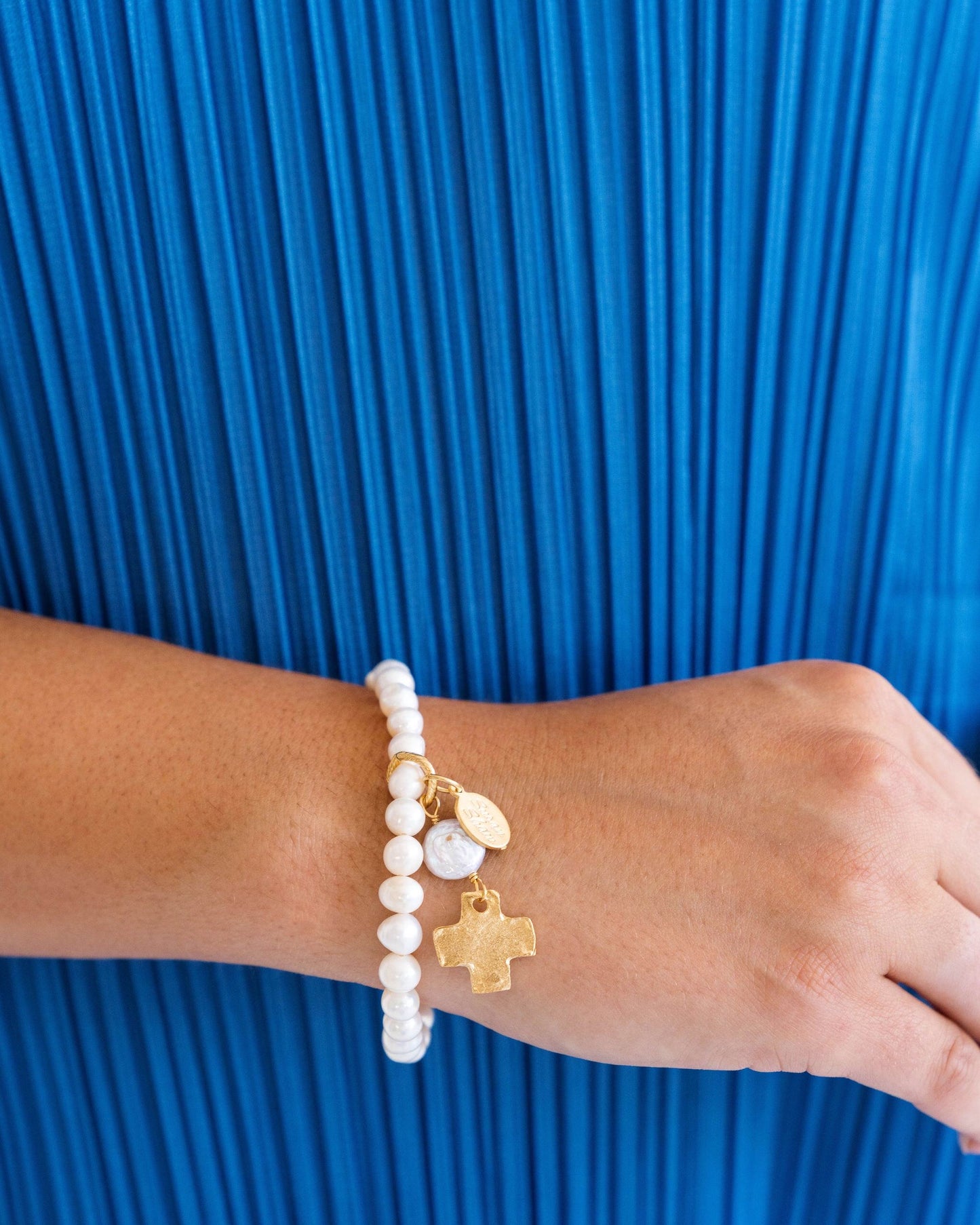 Stretch Bracelet with Pearl Cross Design