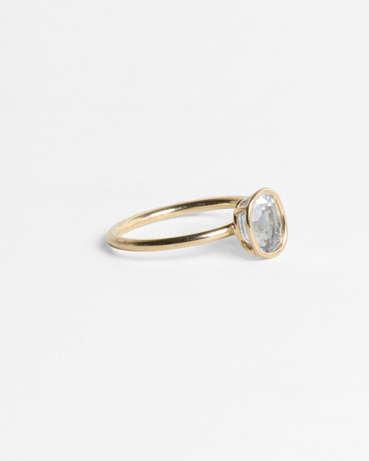 Pale Oval Sapphire 14K Gold Floating Ring