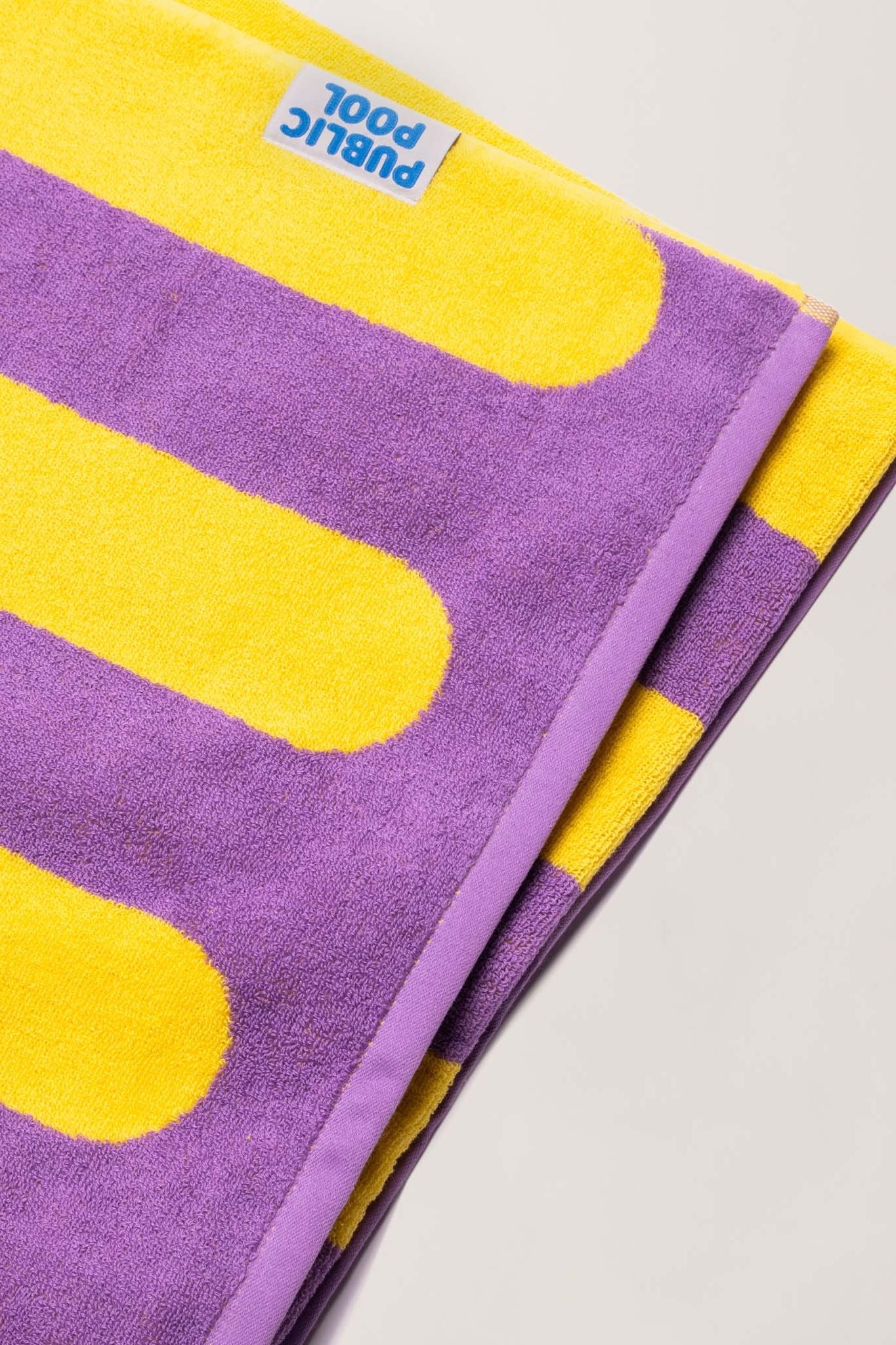 Grape Glow Towel by Public Pool