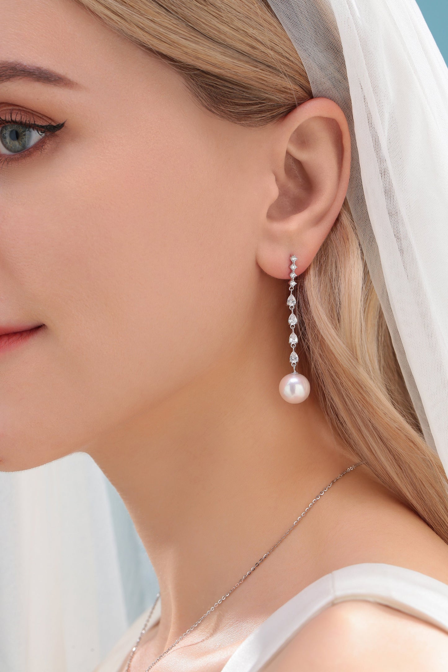 Long Freshwater Pearl Earrings with Sparkling Design