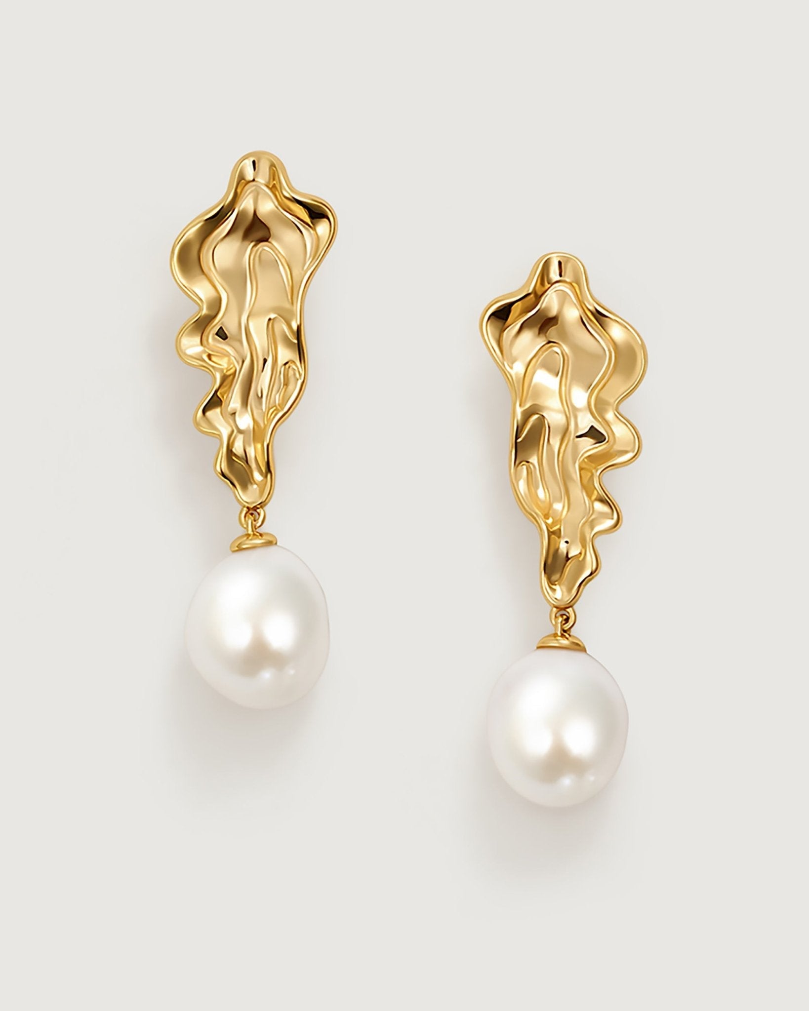 annual-ring-pearl-earring-813915_c5c13e46-e499-4b24-b484-1b0d84c7fa8c.jpg