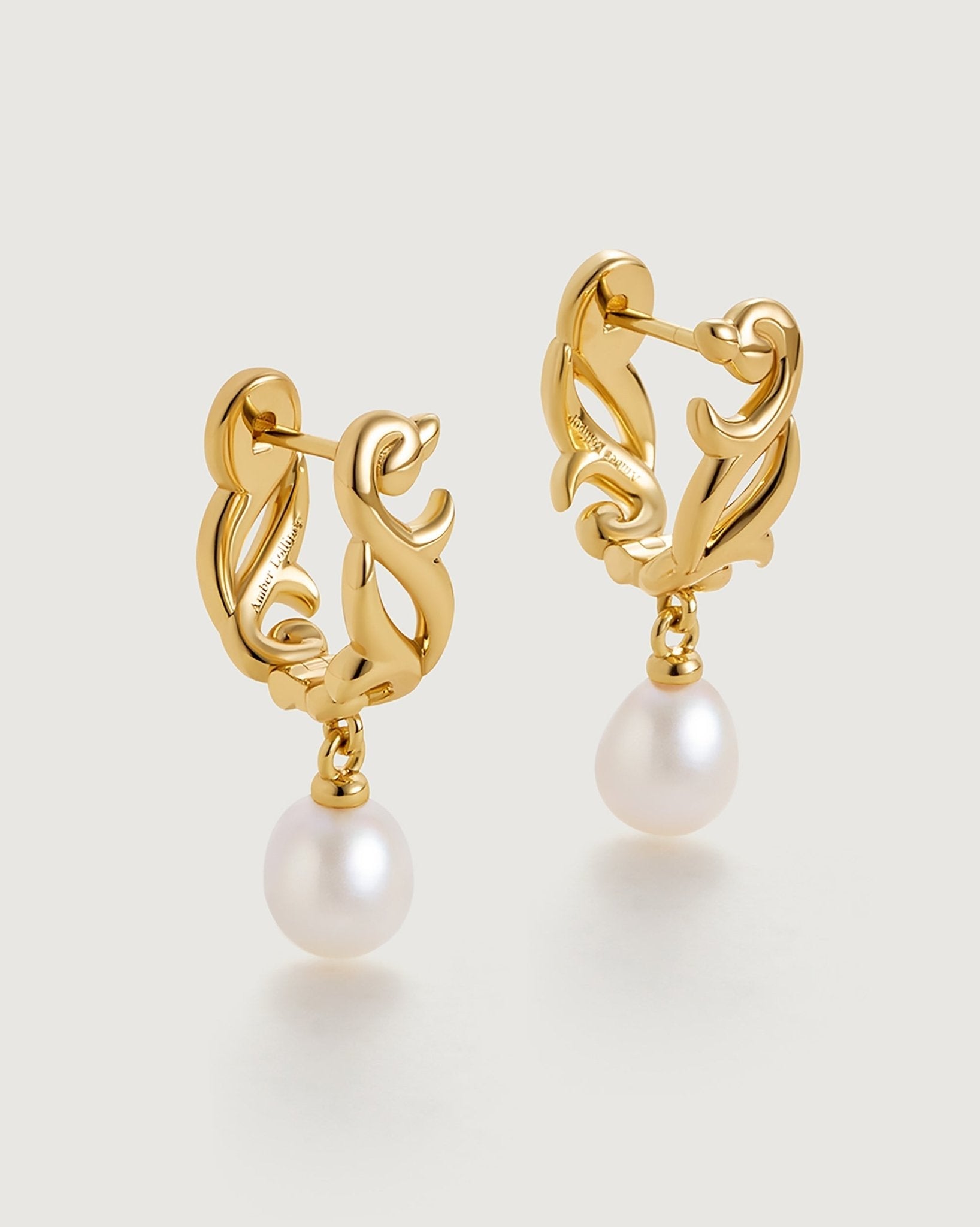 arabesque-hoop-earring-734939_f7138b69-0d1a-44a9-ae0e-cc1f7007c48b.jpg