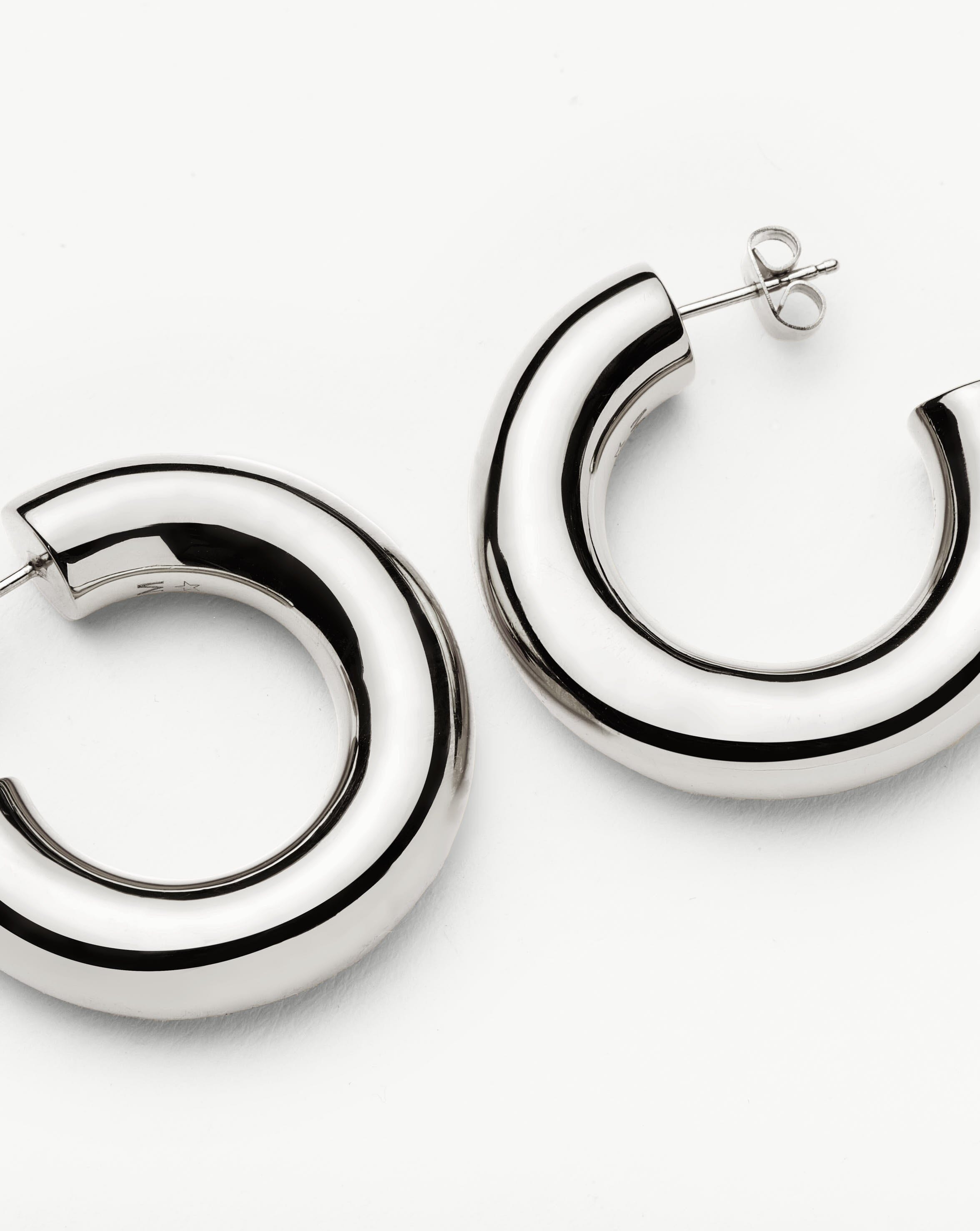 chubby-large-hoop-earrings-silver-plated-earrings-missoma-730842_9a07bd44-f25d-46d1-b264-3ed98d71ad08.jpg