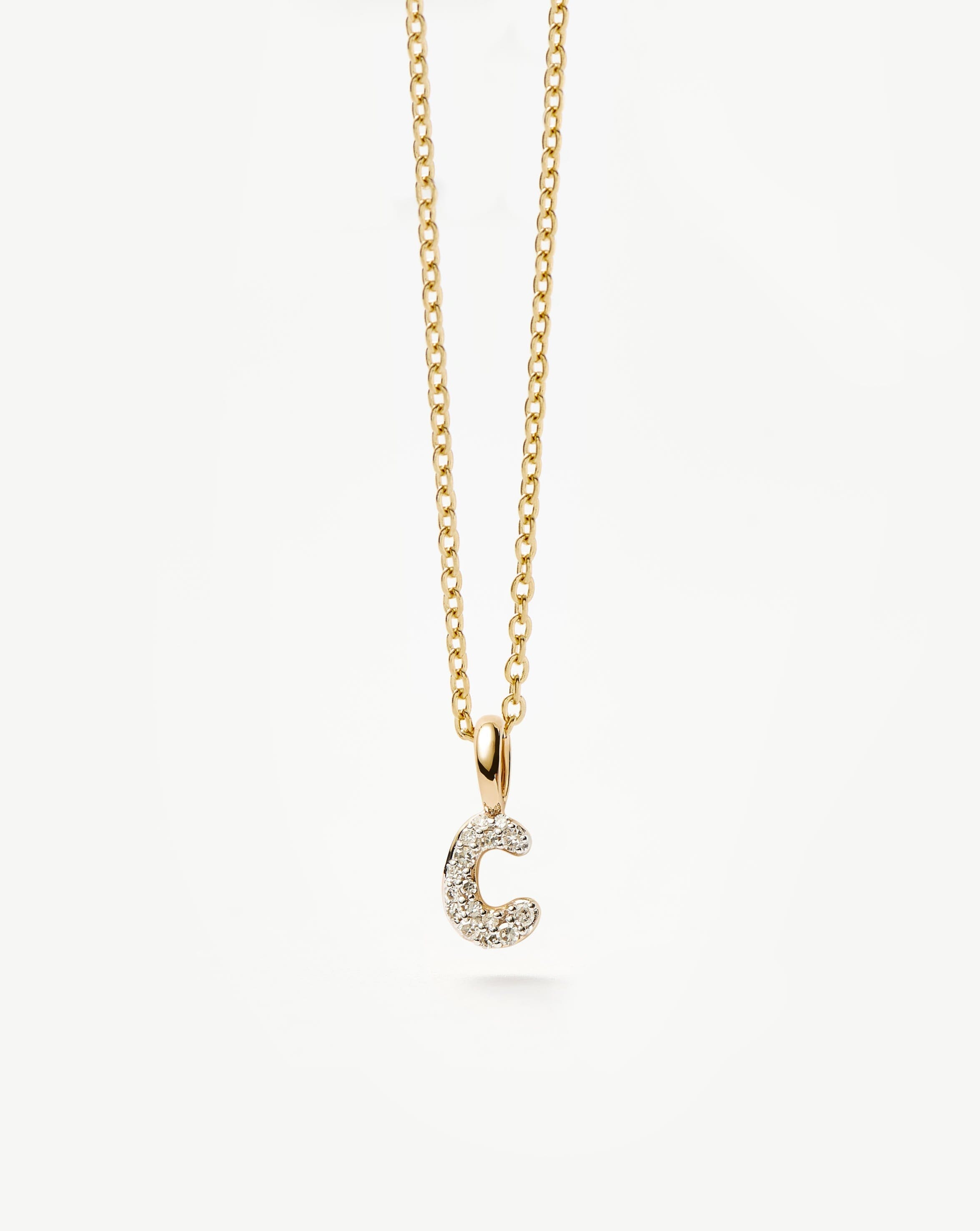 fine-diamond-initial-mini-pendant-necklace-c-14k-solid-yellow-gold-plateddiamond-necklaces-missoma-208233.jpg