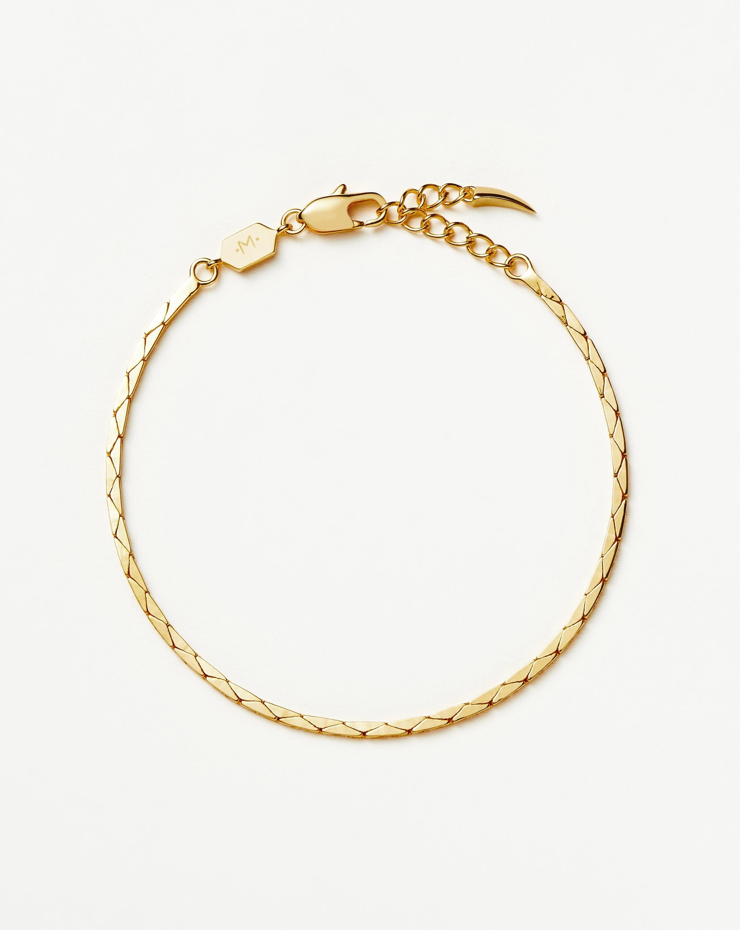 lucy-williams-cobra-snake-chain-bracelet-18ct-gold-plated-bracelets-missoma-682182_23614ed3-e35b-40aa-986b-b8694ca1db91.jpg