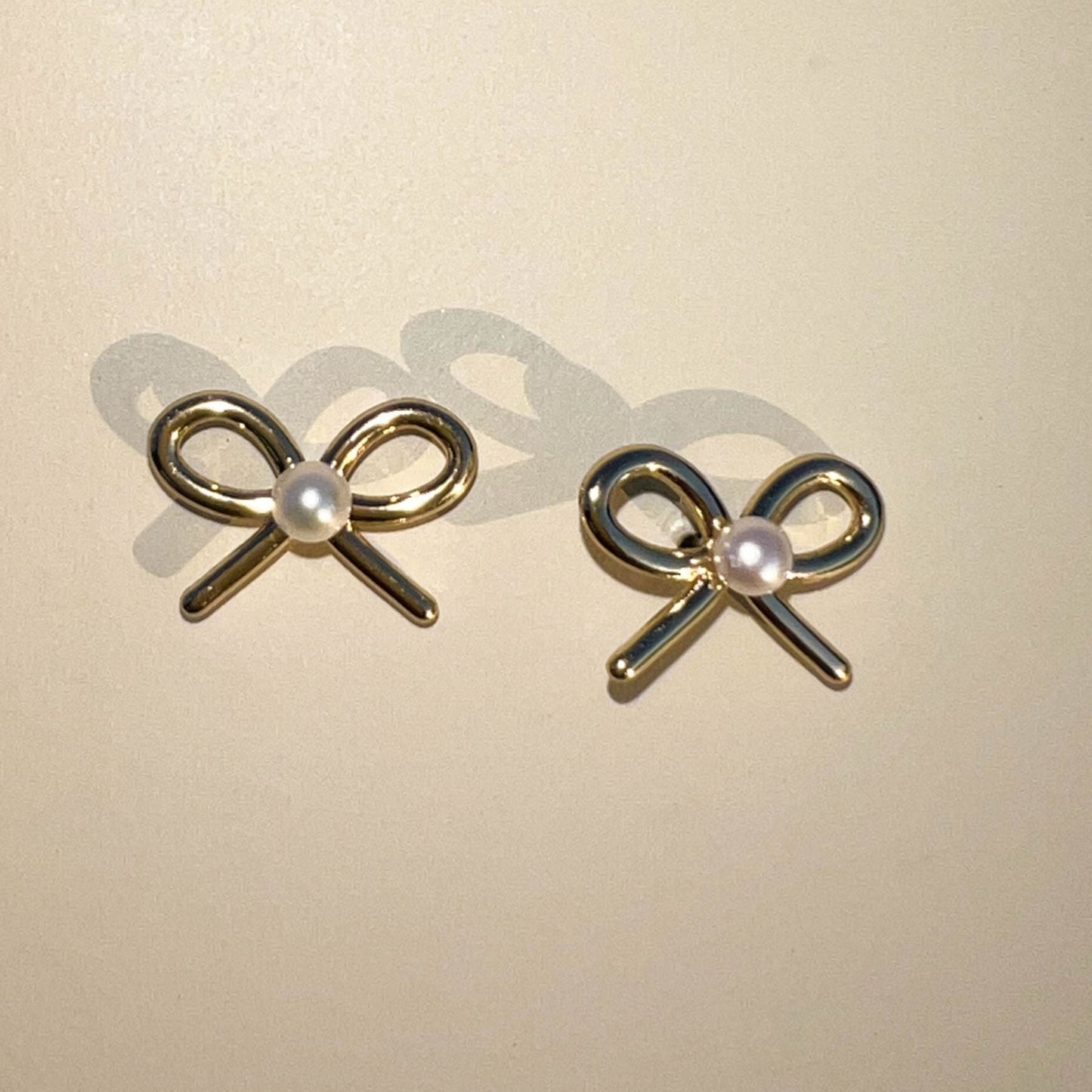 Pearl Bow Design Stud Earrings