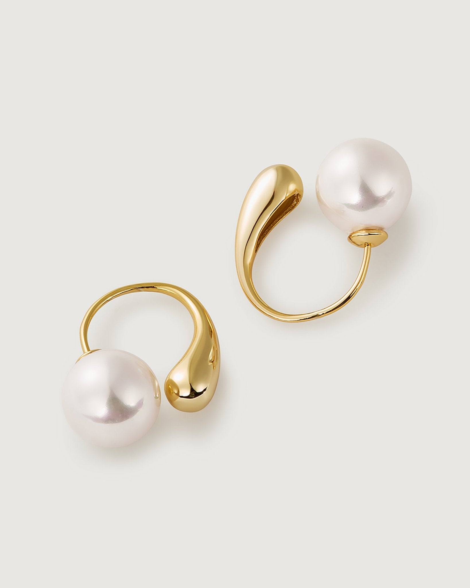 shine-pearl-earring-501505_89f49d71-540b-47c9-9e53-f54059192671.jpg