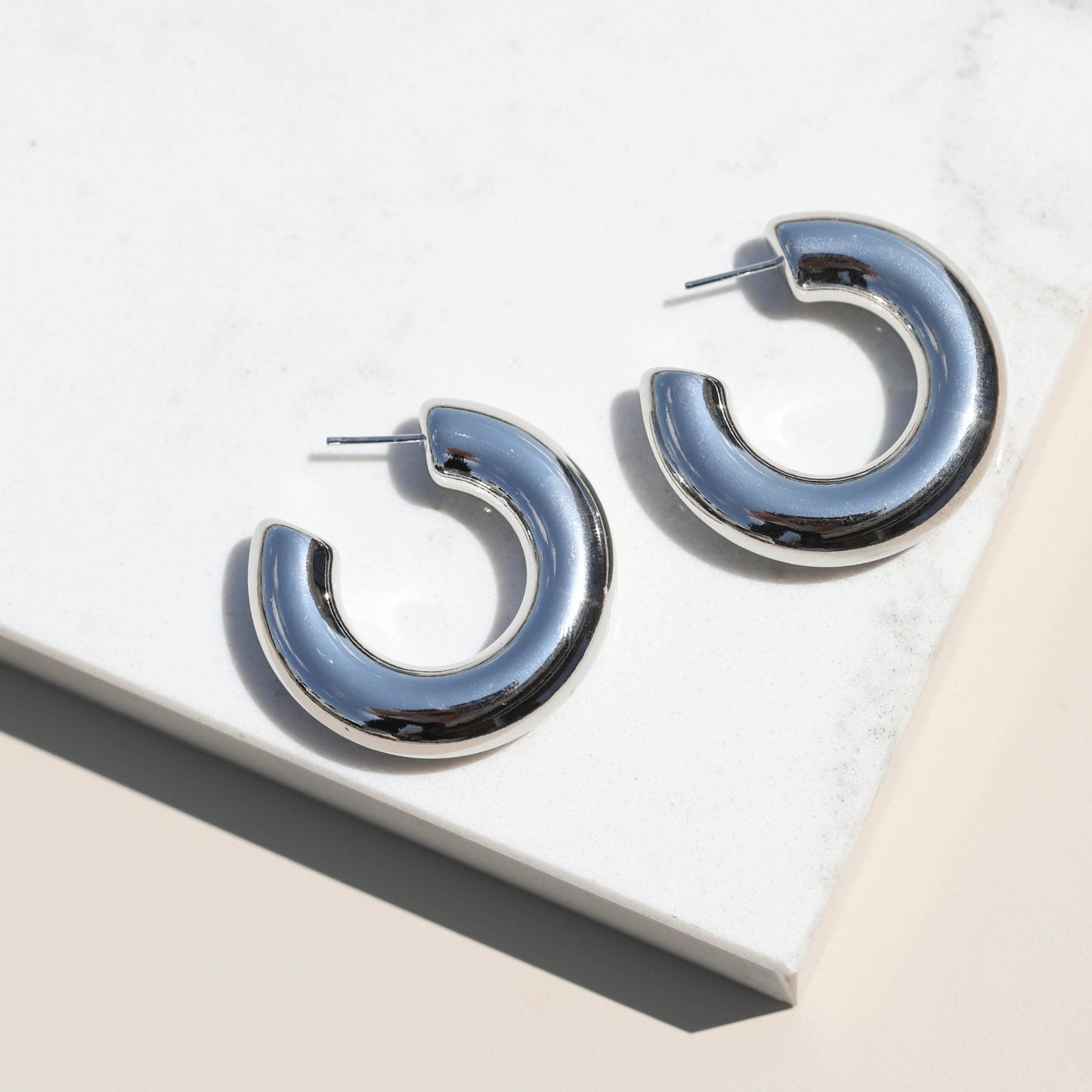 Silver Hoop Earrings in Donut Style