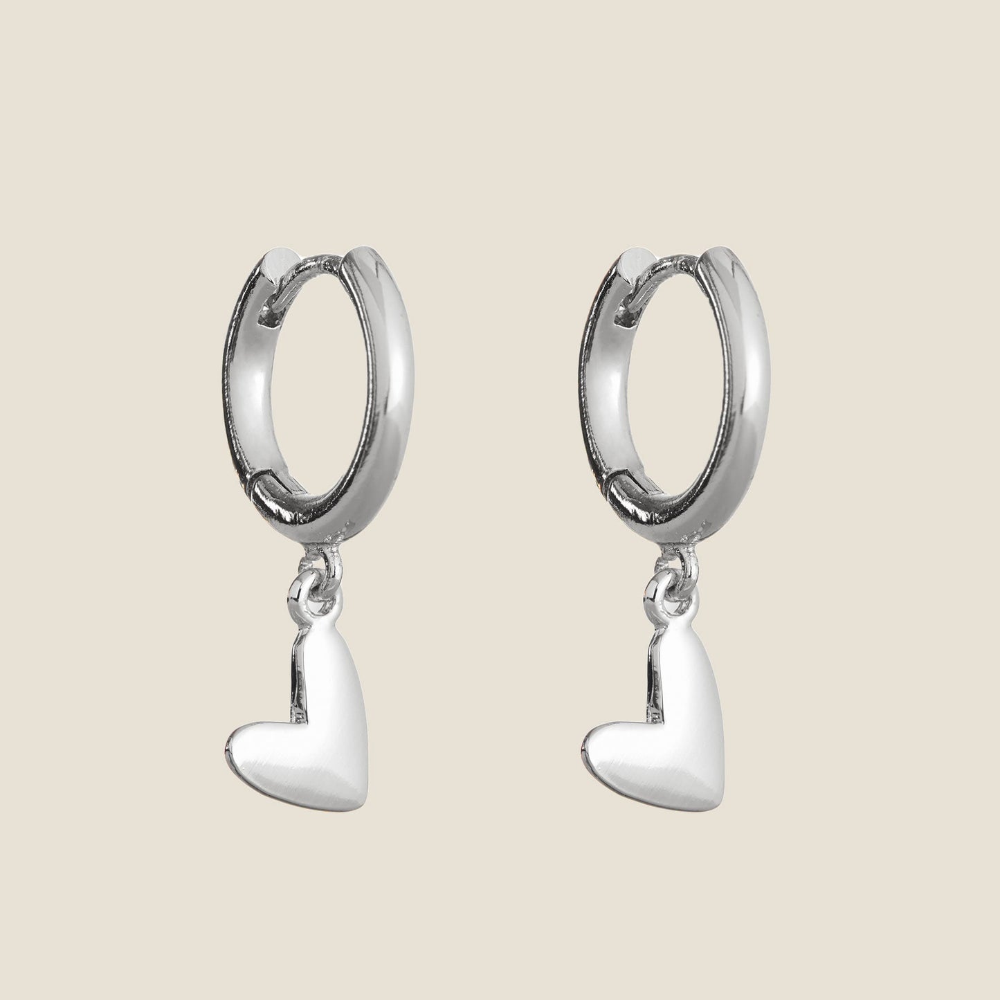 Silver Sweetheart Design Huggie Earrings