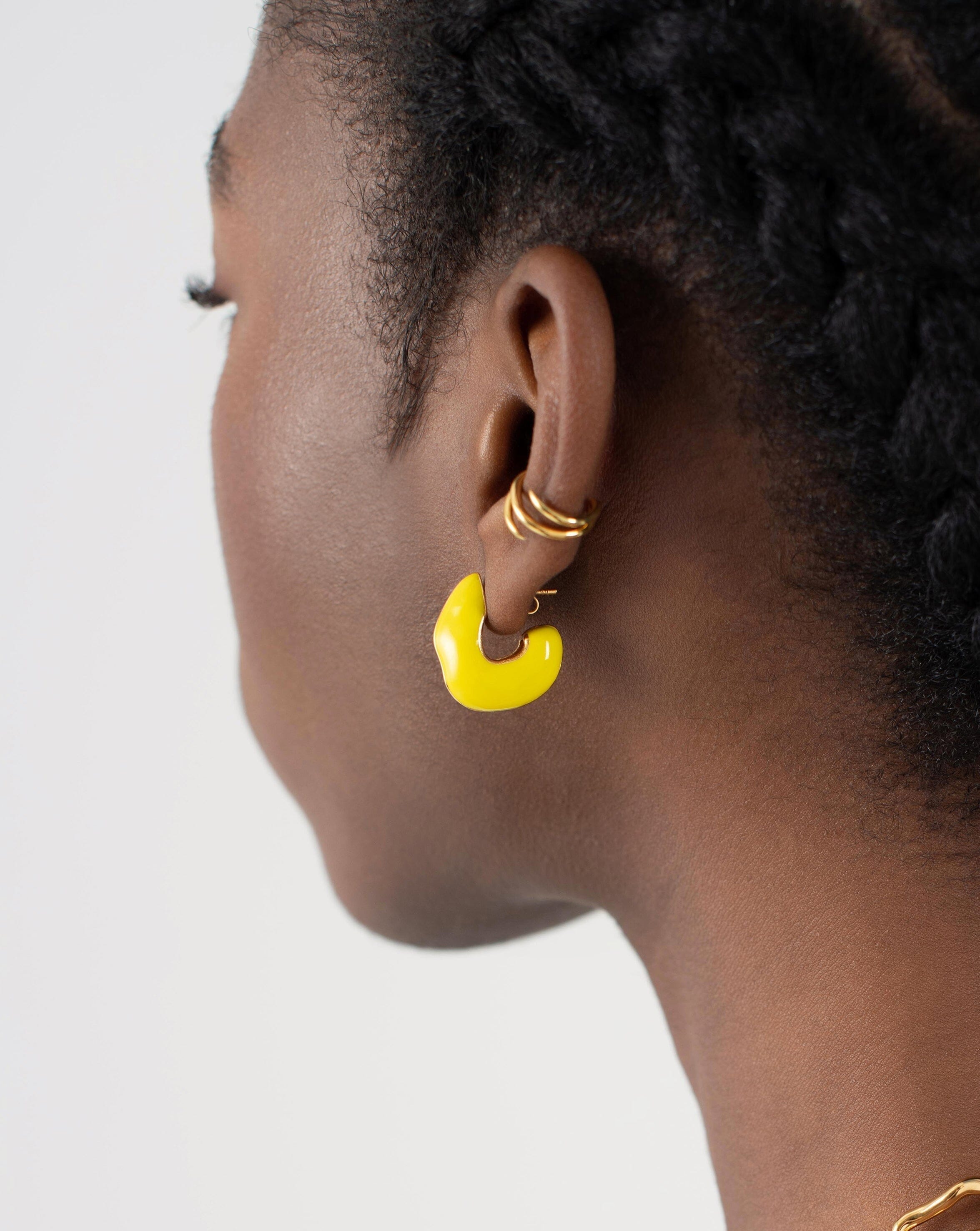 squiggle-chubby-two-tone-enamel-hoop-earrings-18ct-gold-plated-lemon-yellow-earrings-missoma-377194.jpg