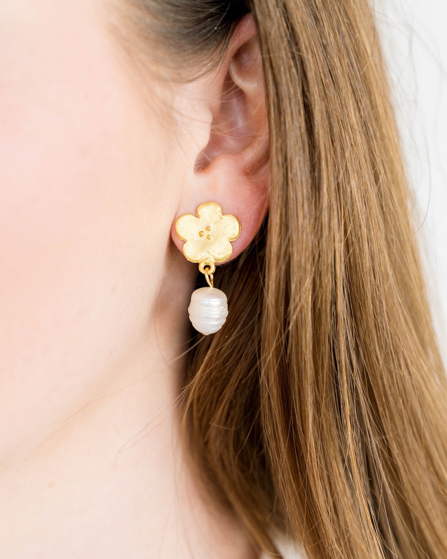 Elegant Pearl Drop Earrings with Poppy Design