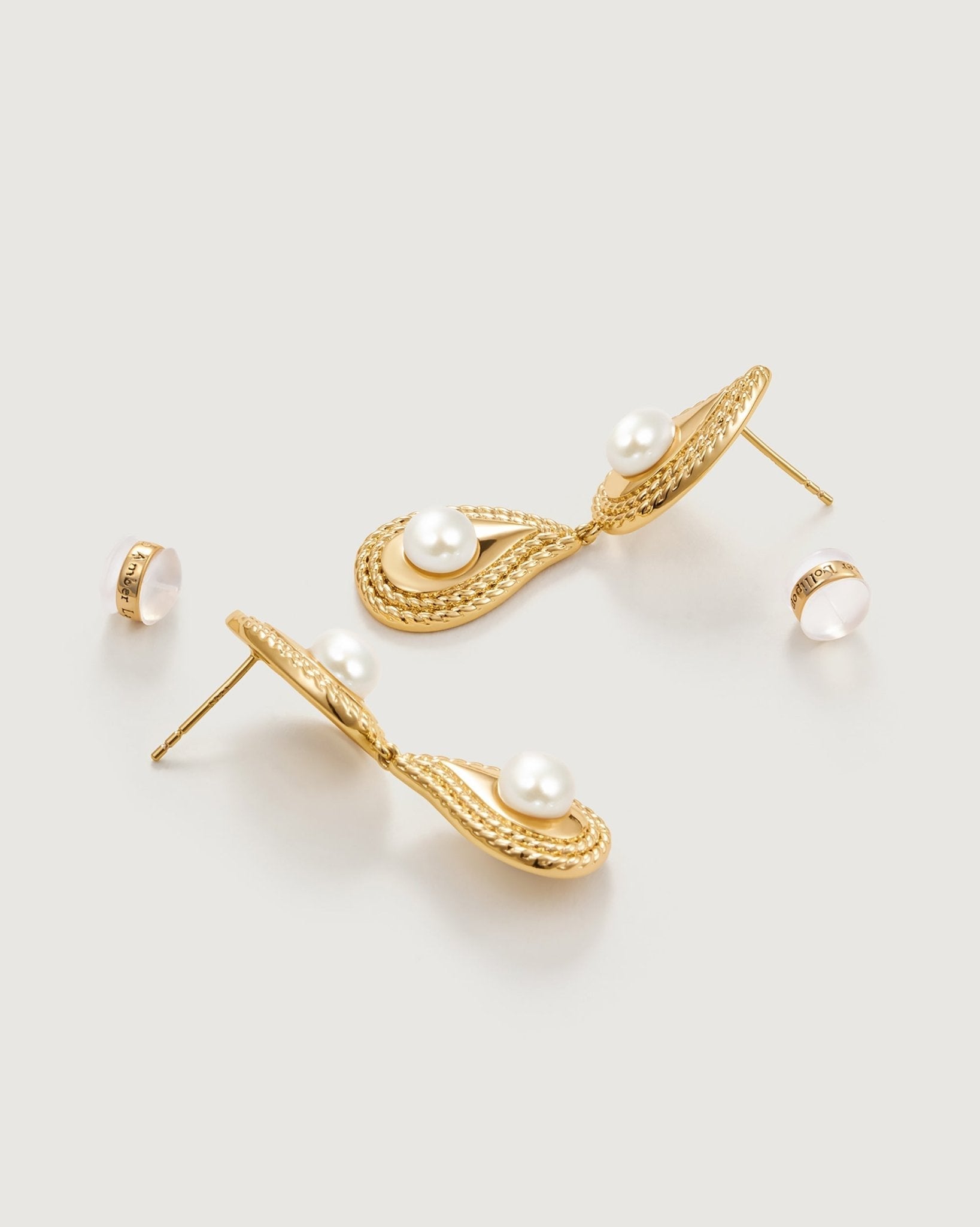 teardrop-pearl-earring-702229_7400956c-72d9-44f2-a023-073fca97b54d.jpg