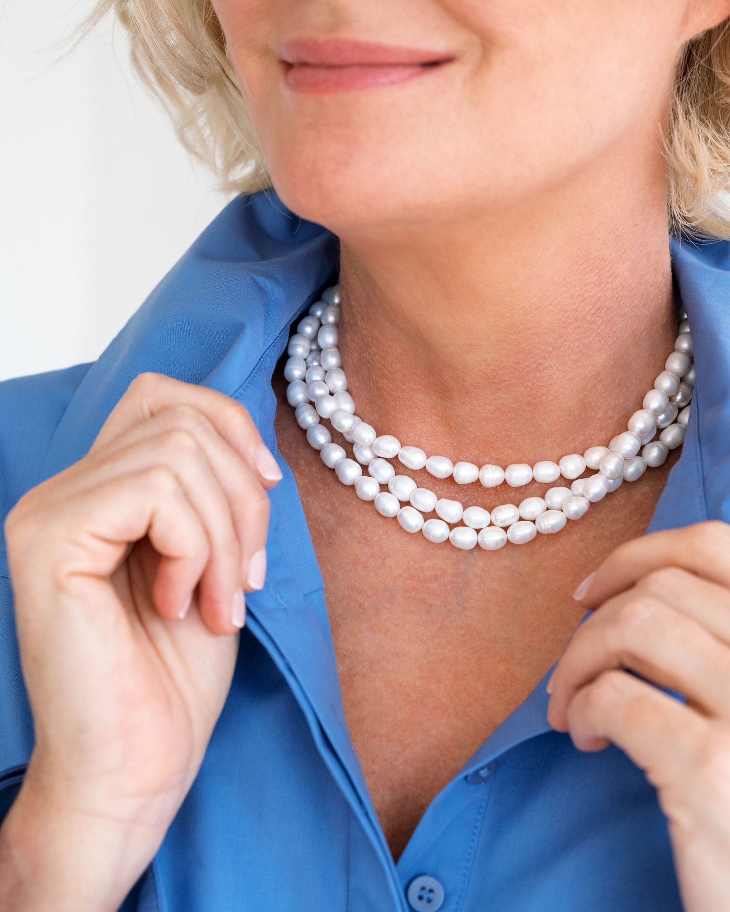 Elegant Triple Strand Pearl Necklace in Classic Style