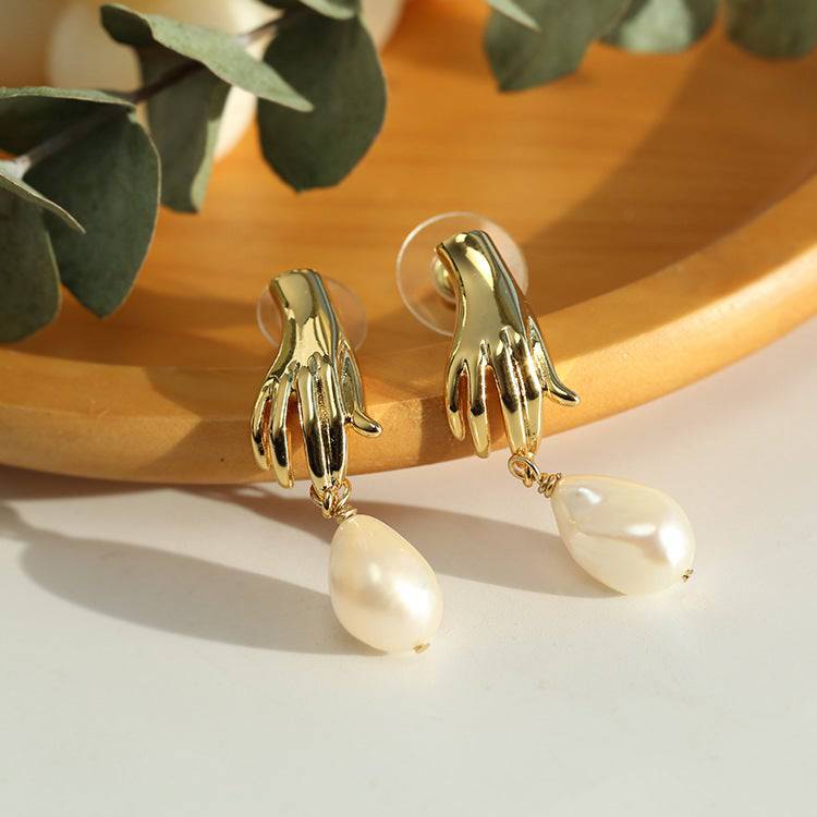 Gold Earrings with Finger Pearl Design