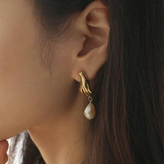 Gold Earrings with Finger Pearl Design