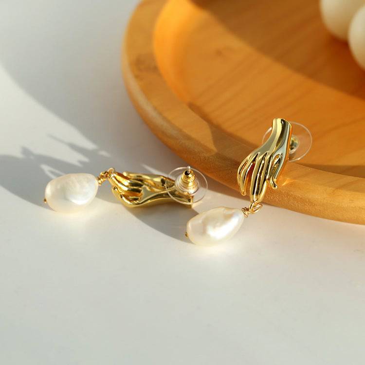 Gold Earrings with Finger Pearl Design